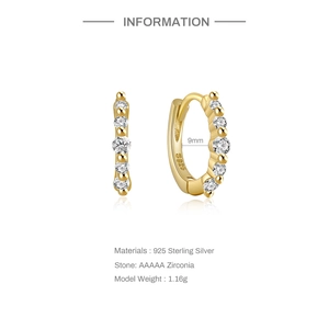 Detail view of 925 sterling silver gold hoop earrings with 5A zirconia and 9mm size