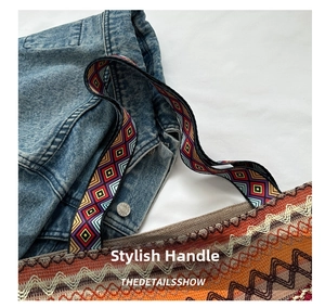Detail of bohemian woven shoulder bag with colorful geometric strap and wave embroidery