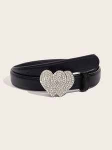 Detail of black leather belt featuring double heart buckle with sparkling rhinestones