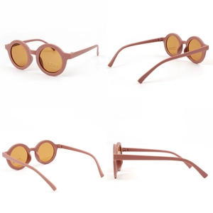 Toddler round frame UV400 sunglasses in matte lotus pink with orange lenses, 360 degree view