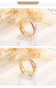 Detailansicht zweifarbiger Edelstahl-Partnerringe in Gold und Silber mit kleinen Diamanten
