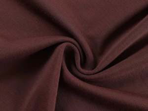 Detailed macro view showing dark brown knitted fabric texture and soft ribbed material