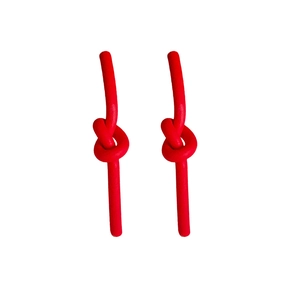 Minimalist red knotted stud earrings with a matte finish and artistic silver pin design