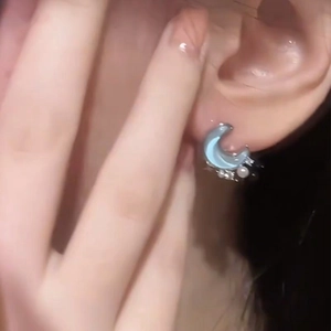 Blue moon stud earrings with white pearls and sparkling crystals on silver base