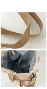 Close-up of large canvas tote bag with woven strap and functional interior striped pockets