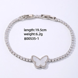 Detail of CZ micro-pave butterfly tennis bracelet in silver finish showing 19.5cm length