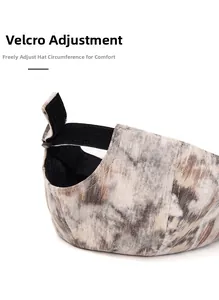 Detail of adjustable velcro strap on marble print newsboy cap for head size comfort