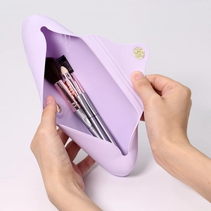 Purple silicone makeup brush holder with magnetic closure for travel and dustproof storage