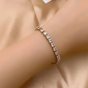 Sparkling gold tennis bracelet for women with square zircon stones on champagne silk