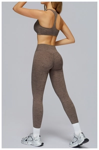 Detail shot of racerback sports bra and high-waist leggings with back lifting effect