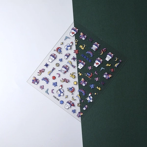Detailed view of 5D embossed Chinese opera cat stickers on green and white background