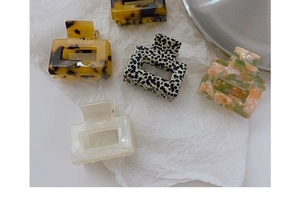 Detailed set of five tortoiseshell and marble patterned square hair claw clips