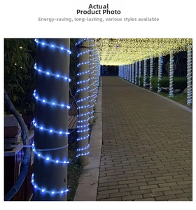 Outdoor solar rope lights wrapped around corridor pillars in blue and warm yellow