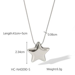 Detail view of silver star pendant necklace showing exact 2.34cm height and dimensions