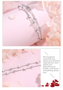 Detailed macro view of 925 sterling silver star bracelets with elegant box chain