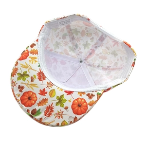 Internal view of polyester baseball cap featuring autumn pumpkin and maple leaf print