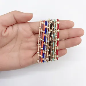 Handmade Miyuki bead bracelet set with freshwater pearls and golden metallic spacers