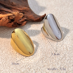 Minimalist wide organic shaped geometric rings in polished gold and silver finish