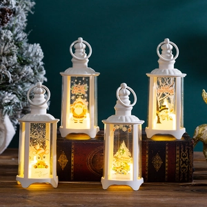 Set of 4 white Christmas lanterns with LED candles and festive holiday illustrations