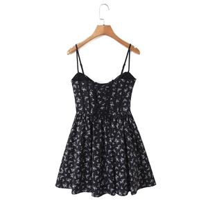 French vintage puff dress with purple and white floral print and back lace-up detail