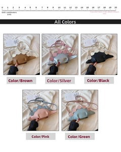 Detail view of mini dinosaur crossbody bags in five colors with adjustable straps