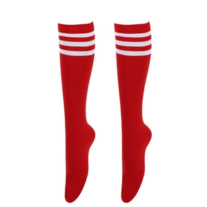 Detail of red knee-high socks featuring three white stripes in a sporty athletic design