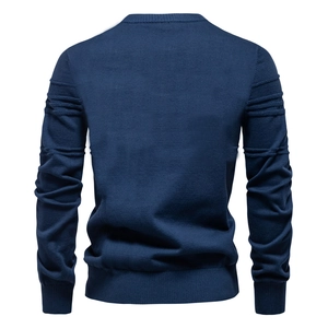 Detailed back view of dark blue long-sleeve knit sweater showing horizontal textured patterns
