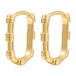 Detailed view of gold geometric hoop earrings with textured ribbed design and high-shine finish