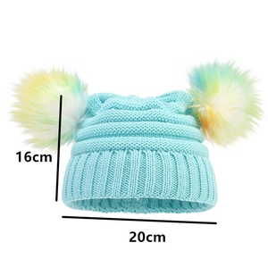 Detailed size specifications of the mint green knitted hat with colorful double pompoms