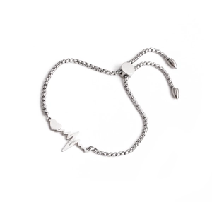 Adjustable stainless steel heartbeat bracelet with heart charm and slider clasp on white