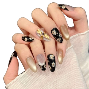 Vintage silver flower press-on nails with cat-eye effect and 3D gold butterfly detail