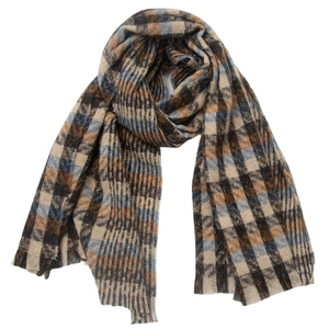 Detail of checkered autumn winter scarf with soft fringes and plaid pattern texture
