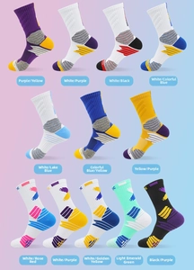Array of colorful athletic mid-calf socks with thick protective zones and geometric logos