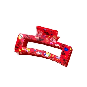 Red rectangular hollow hair claw clip with colorful Happy New Year festive print patterns