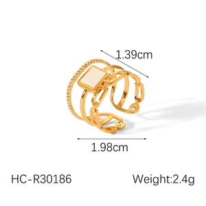 Detail showing gold plated layered ring dimensions of 1.98cm width and 2.4g weight