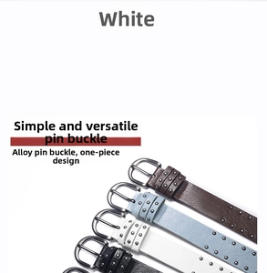 Detail of studded leather belts in black, white, blue and brown with silver alloy buckles