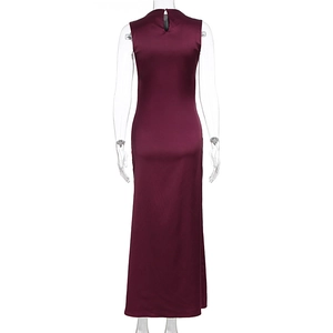 Detail of burgundy sleeveless satin dress back with teardrop cutout and button closure