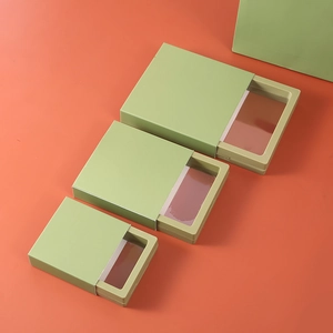 Three light green sliding display boxes with PE film windows on orange background