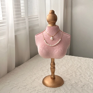 Pink velvet mannequin necklace display stand with gold base for jewelry organization