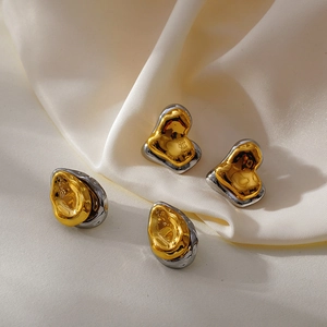Boucles d'oreilles vintage bicolores or et argent aux formes abstraites et de cœur