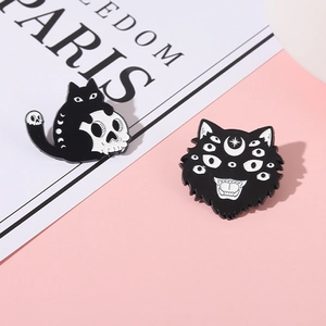 Gothic black enamel cat skull brooches and mystical multi-eyed cat head pin badges