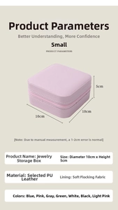 Detail view showing compact 10x10x5cm pink PU leather jewelry box with zipper and soft lining