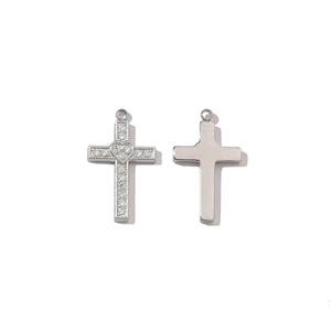 Detail of silver stainless steel cross pendant with crystals and heart center for DIY jewelry