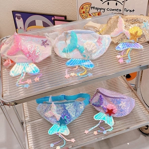 Detail showing five colors of mermaid sequin waist bags for children with starfish charms