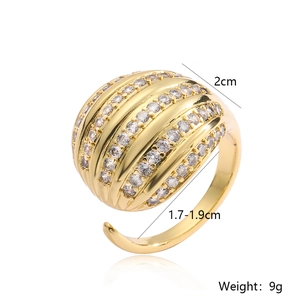Macro detail of gold plated ball ring with zircon pavé showing 2cm height and weight 9g