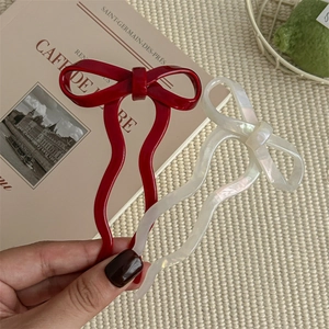 Ballet style bow hair pins in red and pearly white finish for elegant updos