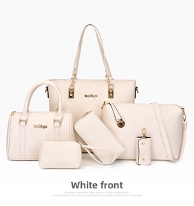Detailed six-piece white faux leather handbag set with tote, purse, and gold hardware