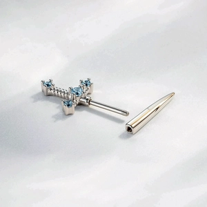Silver cross stud earring with micro-set blue zircon and screw-back cone fastener