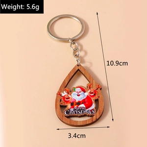 Vue détaillée du porte-clés de Noël en bois en forme de larme avec dimensions précises
