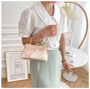 Elegant Chinese style mini qipao handbag with floral embroidery and golden chain strap